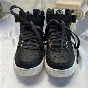 NWOB Nike Kids Black and White Sneakers with Gold Accents